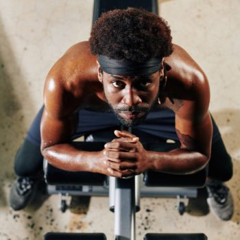 shirtless-muscular-man-resting-on-bench-2023-11-27-05-32-21-utc